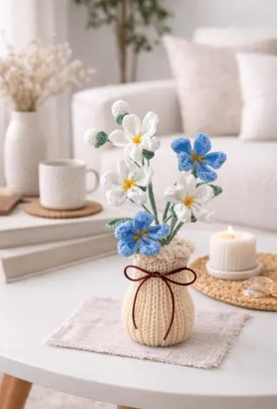 Handmade crochet flowers bouquet in a vase